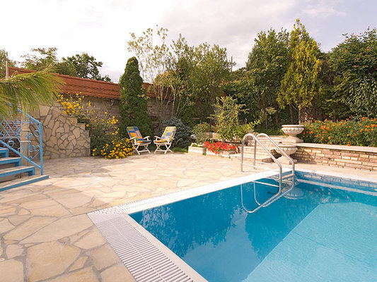 Our hotel is in the centre of Tihany, one of the oldest villages in Hungary, built on  the peninsular on the north side of Lake Balaton, which is famous for its Benedictine Abbey, founded in the llth century.
