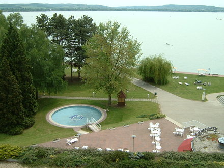 The 4-star club is a hotel and holiday village complex which lays on a 13 hectares area. It is located on the edge of the Tihany-peninsula which became a nature reserve in 1952.